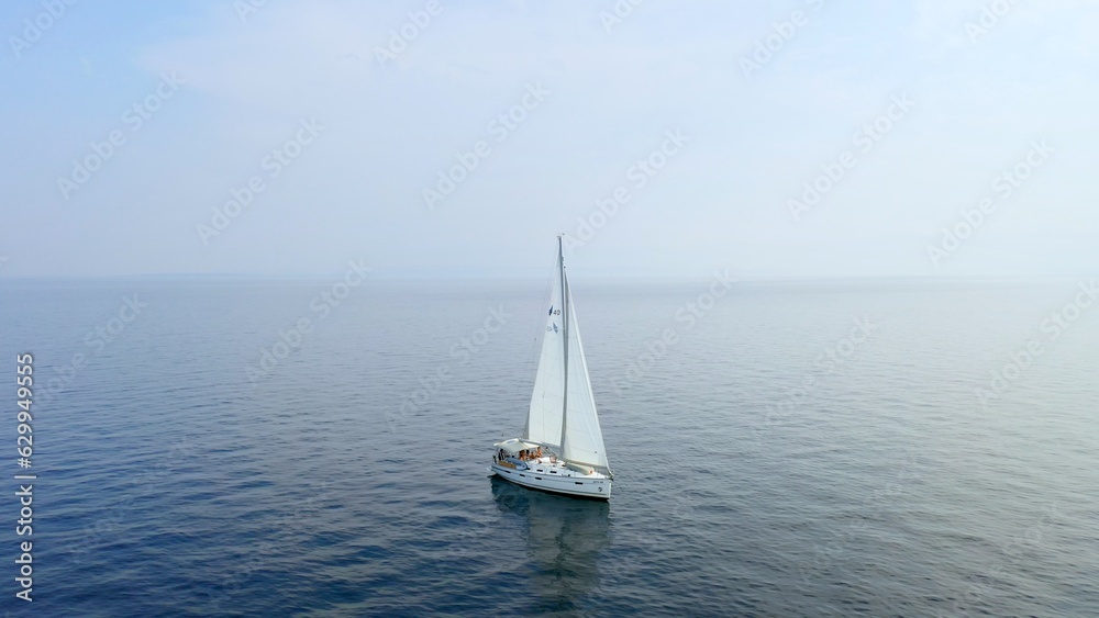 Sailing yacht in the sea. Beautiful aerial drone shot.