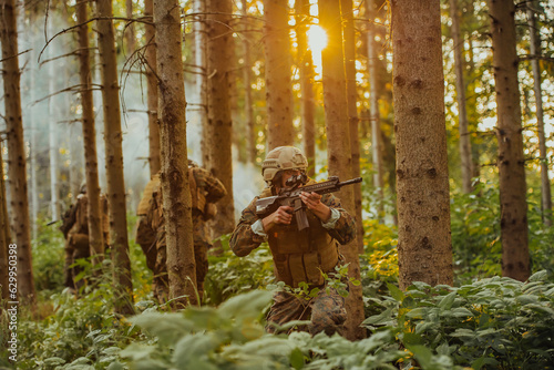 Canvas Print A group of modern warfare soldiers is fighting a war in dangerous remote forest areas