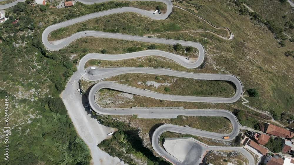 Aerial view of the road climbing on mountain top Maratea, Potenza, Basilicata, Italy. Aerial view of the road climbing on mountain top Maratea, Potenza, Basilicata, Italy.