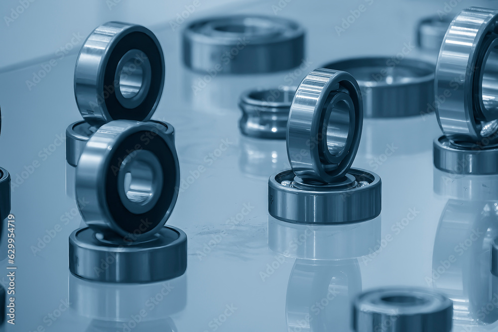 The group of cylindrical rolling bearing parts in light blue scene.
