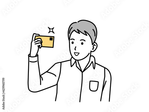 スマートフォンで自撮り、写真撮影する若い男性