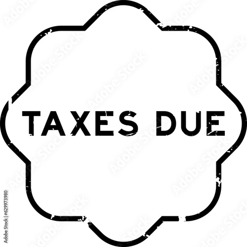 Grunge black taxes due word rubber seal stamp on wthie background
