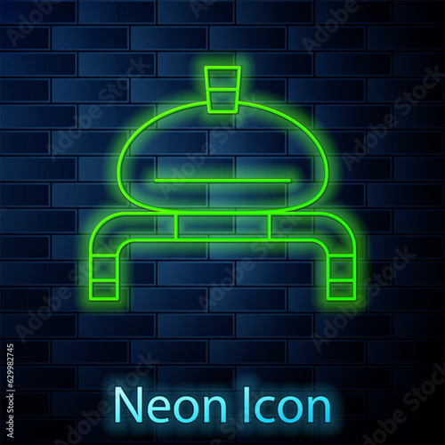 Glowing neon line Bread and salt on towel icon isolated on brick wall background. National food loaf. Traditional ukrainian wedding bread. Vector