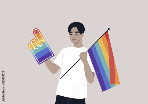 A Pride foam finger colored with rainbow colors, LGBTQ community support