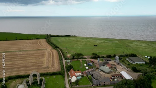 4k drone footage of St Andrew's Church, Covehithe in Suffolk, UK photo