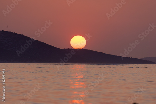 Fototapeta Naklejka Na Ścianę i Meble -  Sunset on the Adriatic Sea near Zlarin Island, Croatia