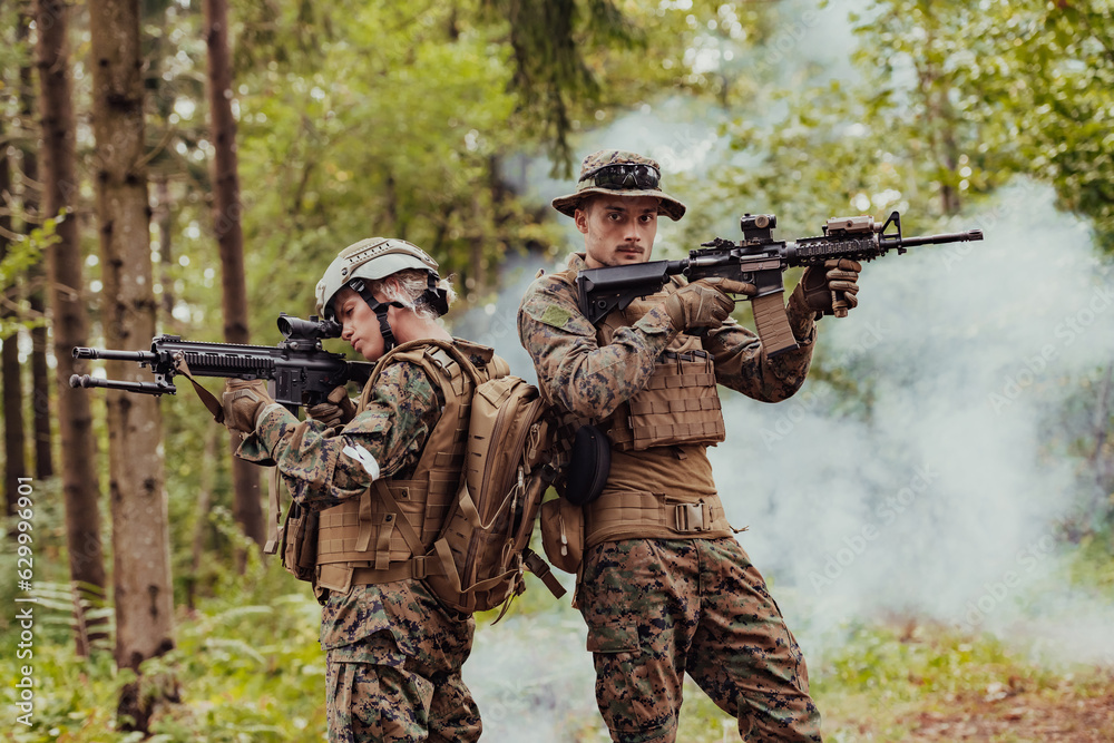Fototapeta premium Modern Warfare Soldiers Squad Running in Tactical Battle Formation Woman as a Team Leader