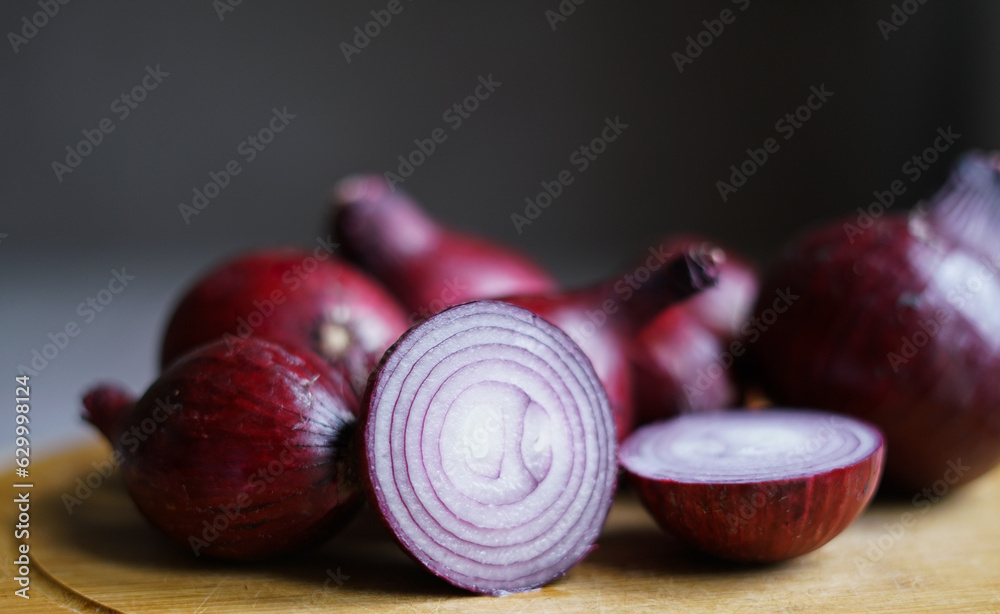 red onions on the wooden board