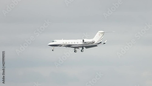 Generic Unmarked Modern Black and White VIP Private Business Executive Jet Luxury Airplane Flying and Landing at a Los Angeles California area Airport