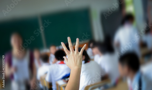 Raised hand in class of middle school