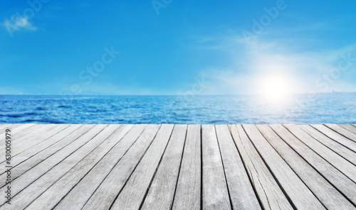 Wood platform beside the sea for background