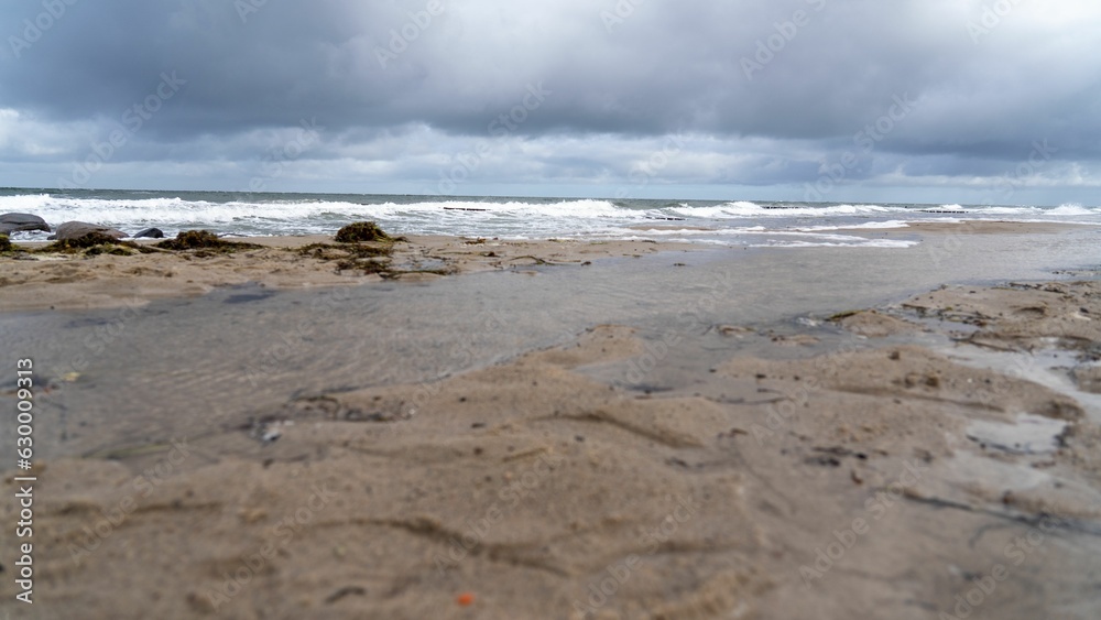 Stunning view of an unpopulated beach shore in Kuehlungsborn, Germany Stunning view of an unpopulated beach shore in Kuehlungsborn, Germany