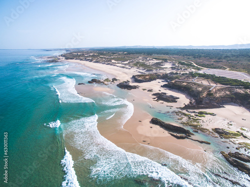 Aerial shot of Praia do Malhao in Portugal showcases a stunning ocean beach and coastline photo