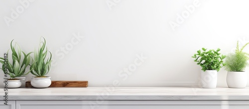 A front view image of a stylish white kitchen background is shown, featuring kitchen utensils and a