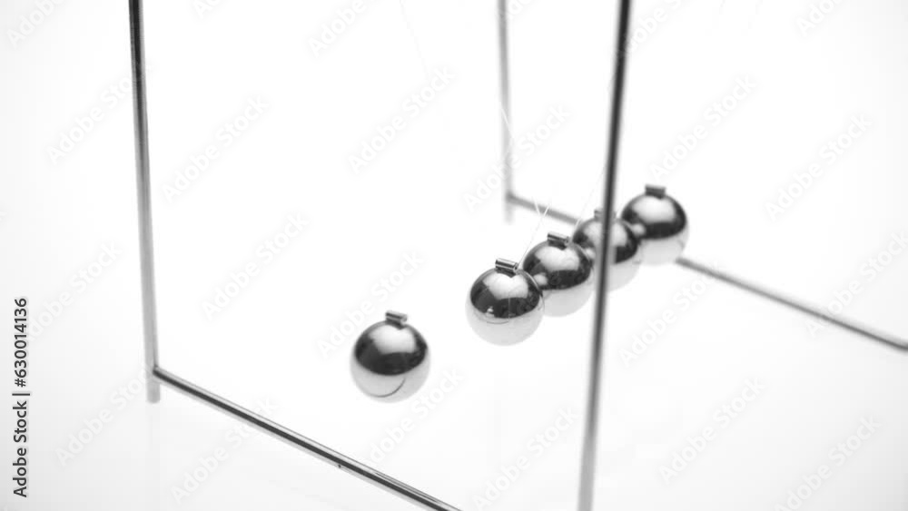 Balancing balls on a white background, isolated. business concept. Newtons Cradle Balancing balls on a white background, isolated. business concept. Newtons Cradle