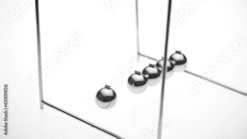 Balancing balls on a white background, isolated. business concept. Newtons Cradle
