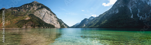 Stunning deep green waters of Konigssee, known as Germany's deepest and cleanest lake, located in the extreme southeast Berchtesgadener. Beautiful wallpaper for desktop. Concept of nature, travelling © master1305