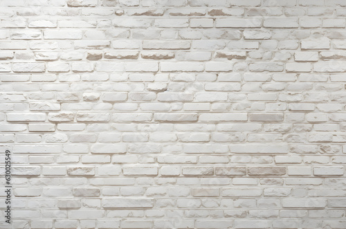 Cream and white brick wall texture background. Old rock pattern on brickwork and stonework flooring