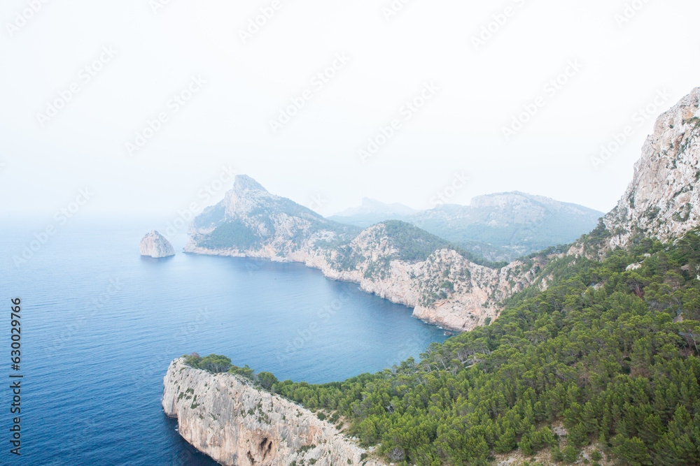 Hiking holidays Mallorca, Spain. Beautiful picture with landscape of Serra de Tramuntana mountains in the island of Majorca in Mediterranean sea. Paradise for bikers. Adventure travel. Hiking holidays Mallorca, Spain. Beautiful picture with landscape of Serra de Tramuntana mountains in the island of Majorca in Mediterranean sea. Paradise for bikers. Adventure travel.