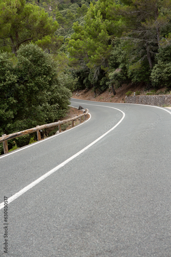 Obraz premium Hiking holidays Mallorca, Spain. Beautiful picture with landscape of Serra de Tramuntana mountains in the island of Majorca in Mediterranean sea. Paradise for bikers. Adventure travel.