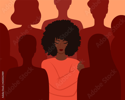 A black woman hugging herself among the silhouettes of people. Loneliness in a crowd. Vector illustration in flat style