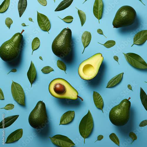 Avocados on a blue background with green leaves generative ai