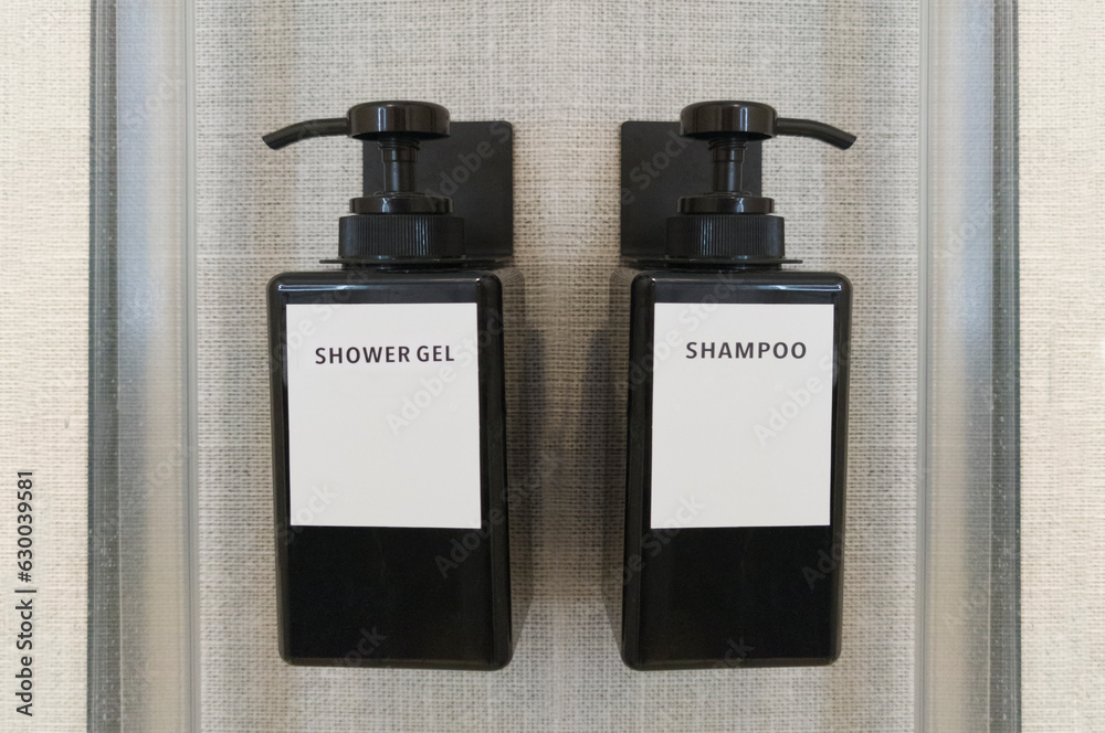 Liquid gel and shampoo dispensers attached to shower wall