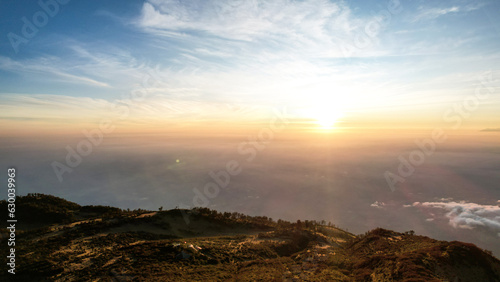 The beautiful Landscape view from Lawu Mountain at sunrise located in Magetan. One of the most beautiful mountains in Java with an altitude of 3265m above sea level. 