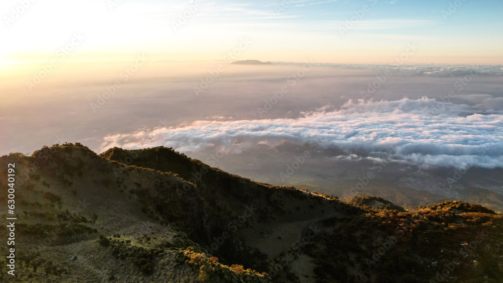 The beautiful Landscape view from Lawu Mountain at sunrise located in Magetan. One of the most beautiful mountains in Java with an altitude of 3265m above sea level. 