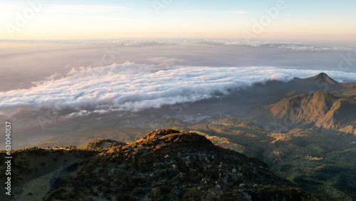 The beautiful Landscape view from Lawu Mountain at sunrise located in Magetan. One of the most beautiful mountains in Java with an altitude of 3265m above sea level. 