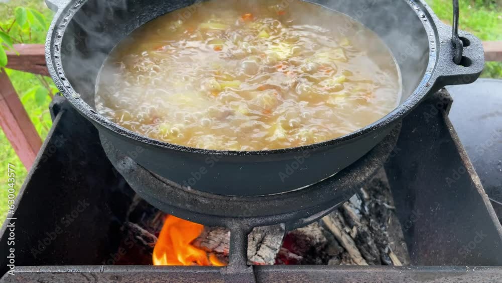 Cooking potatoes and carrots grilled in oil in pan. Cooking potatoes and carrots grilled in oil in pan.