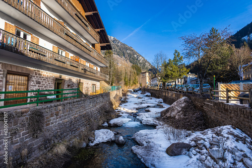 Moena, Italy - February, 17, 2023: In the village of Moena, a community in Trentino in the northern Italian region. Largest town in the Fassa Valley in the dolomites and the gateway to the valley. photo