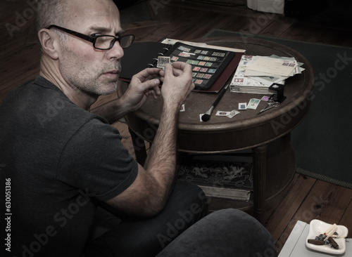 Busy stamp collector being interrupted