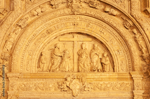 TOLEDO,SPAIN - MARCH 7, 2013: Detail of renaissance portal of Hospital Santa Cruz from years 1504 y 1514 by Alonso de Covarrubias and by plans of architect Enrique Egas photo
