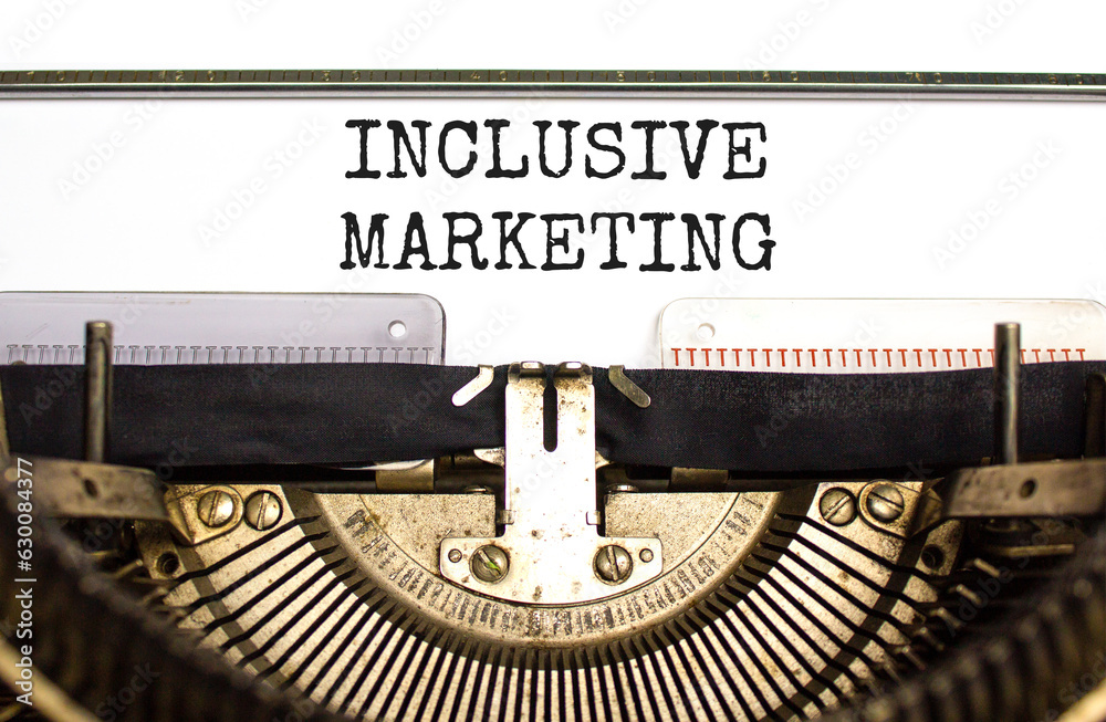 Inclusive marketing symbol. Concept words Inclusive marketing typed on beautiful old retro typewriter. Beautiful white background. Business inclusive marketing concept. Copy space.