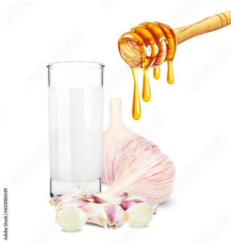 dripping honey, milk and garlic isolated on a white background