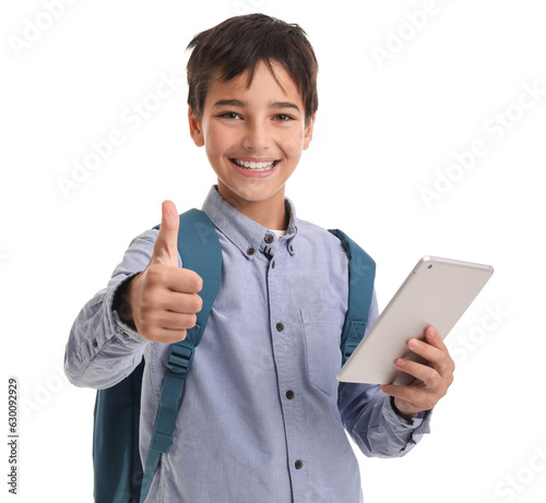 Little schoolboy with table...