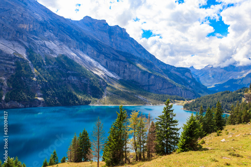 View of Oeschinen lake  Oeschinensee  and Swiss Alps near Kandersteg in Bernese Oberland  Switzerland