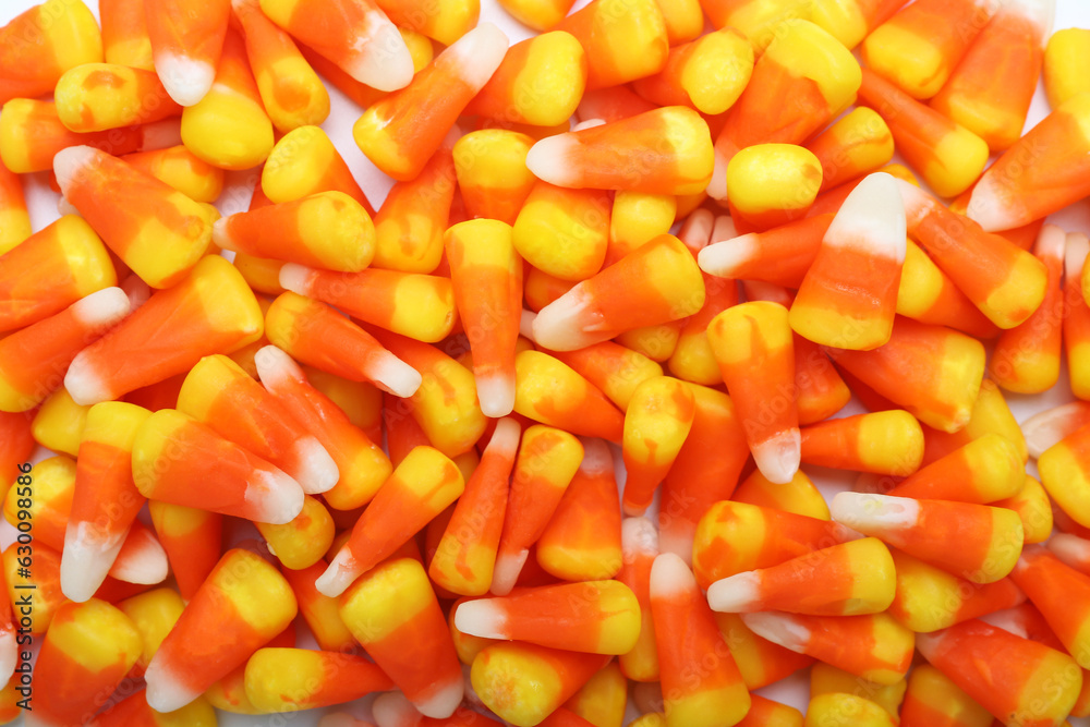 Tasty Halloween candy corns as background, closeup Tasty Halloween candy corns as background, closeup