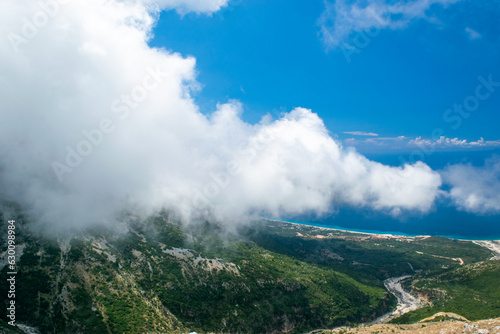 White fog high in the mountains on the Llogara pass. View from the highlands. Landscape of the Albanian Riviera, © jana_janina