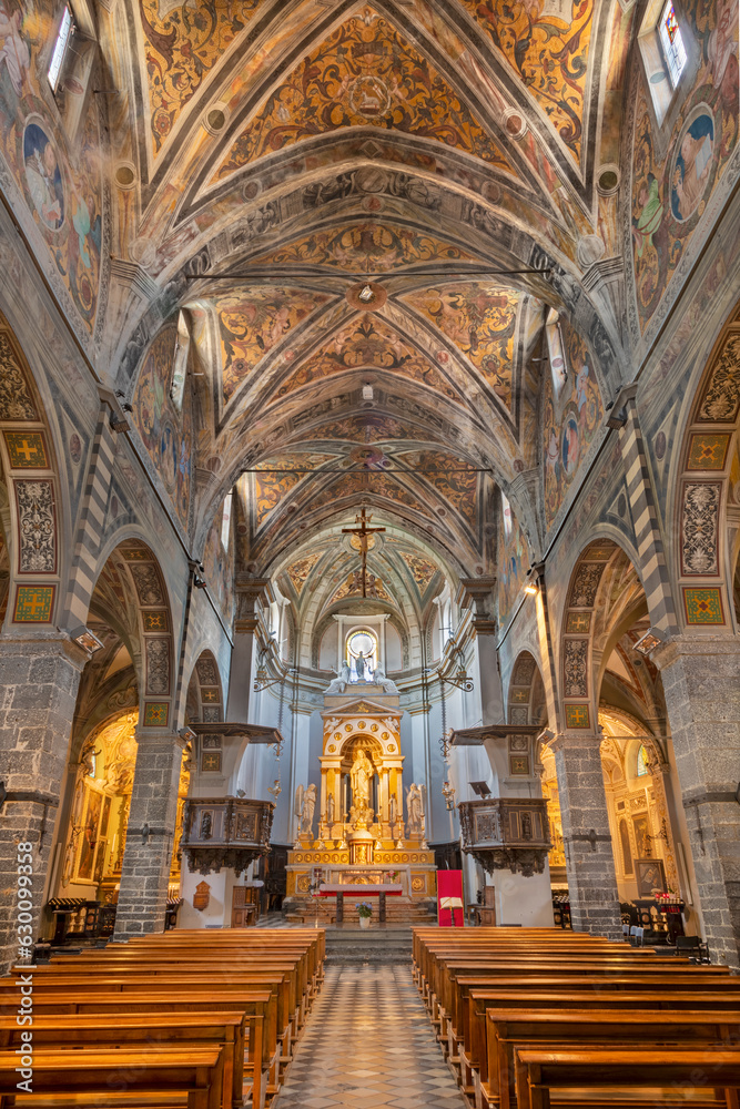 BELLANO, ITALY - JULY 20, 2022: The nave of church Chiesa dei santi Nazareo e Celso with the renaissance ceiling fresco from year (1530).
