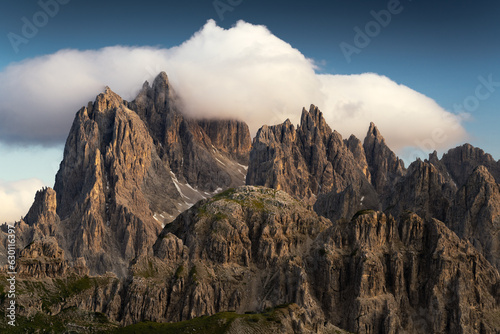 Beautiful mountain rocky peaks lit by beautiful sun and blue sky. Dolomites, Italy
 photo