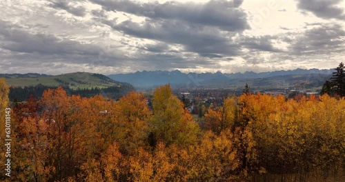 Autumn landscape in the mountains -reveal shot of Bialka Tatrzanska, Podhale, Poland in autumn.