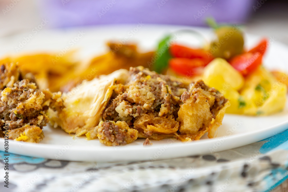 Traditional homemade mayonnaise salad with roasted chicken stuffed with Brazil-style farofa Traditional homemade mayonnaise salad with roasted chicken stuffed with Brazil-style farofa