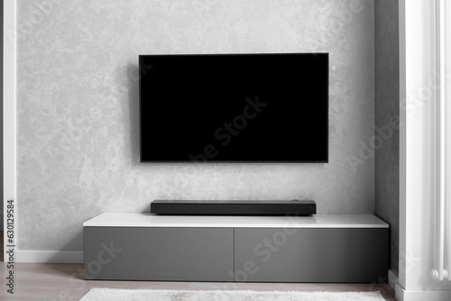 Modern living-room with TV and hifi equipment Sound bar