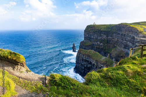 Scenic view of the Cliffs of Moher and O'Brien's Tower at sunrise photo