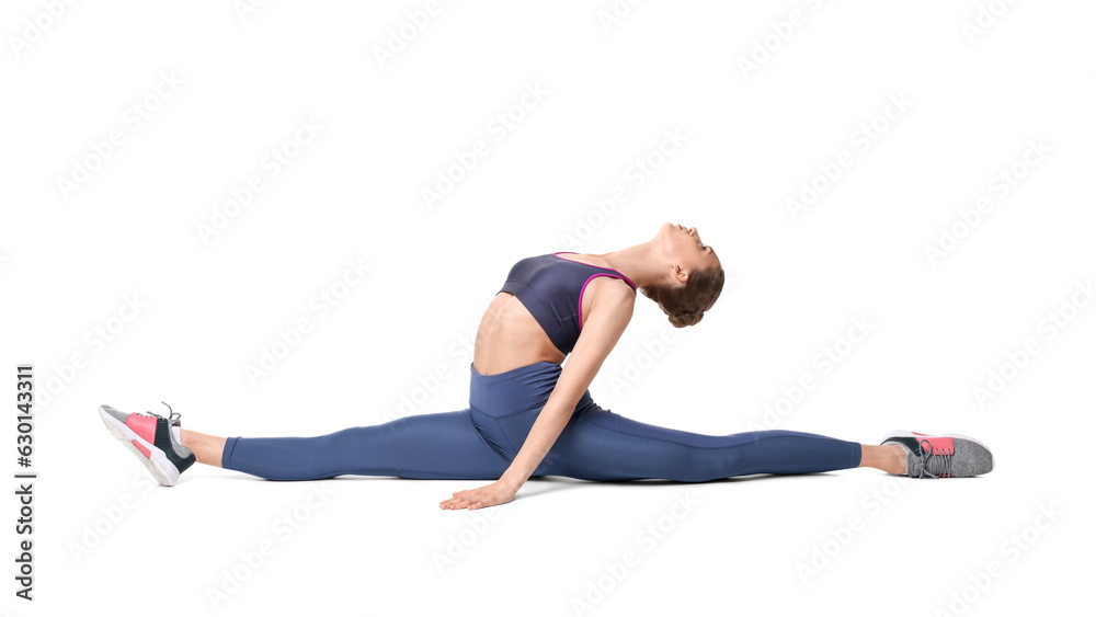 Yoga workout. Young woman stretching on white background Yoga workout. Young woman stretching on white background