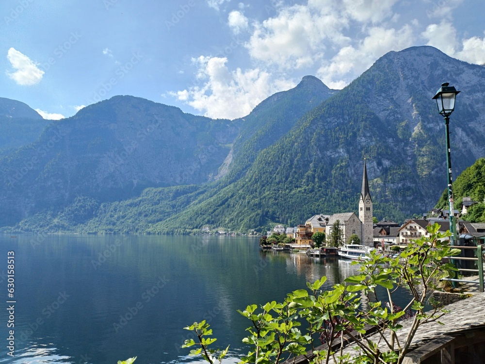 Scenic picture view of famous Hallstatt mountain village with Hallstatt Lake in the Austrian Alps, region of Salzkammergut, Austria. Scenic picture view of famous Hallstatt mountain village with Hallstatt Lake in the Austrian Alps, region of Salzkammergut, Austria.