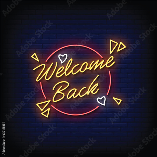 Neon Sign welcome back with brick wall background vector photo