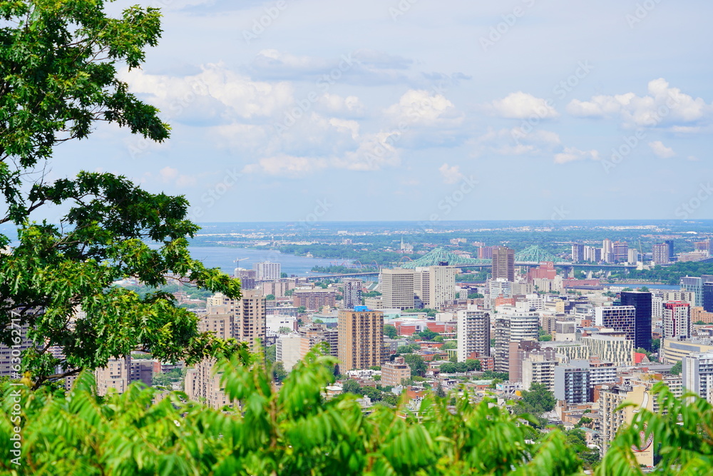 Montreal, Quebec Canada -07 12 2023: Aerial view of Montreal downtown and st Lawrence River from Royal Mount 